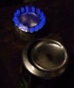 Burning soda can stove with lid