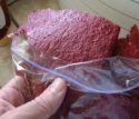 Sheets of strawberry leather in a Ziplock bag