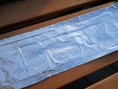 Close the long, open side of the foil by folding it over