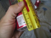 Measure out 20mm from the bottom of the can with holes