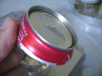 Trim the edges of the simmer ring to fit the top of the soda can stove
