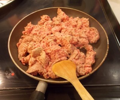 Cooking the ground beef in a pan just like you would normally